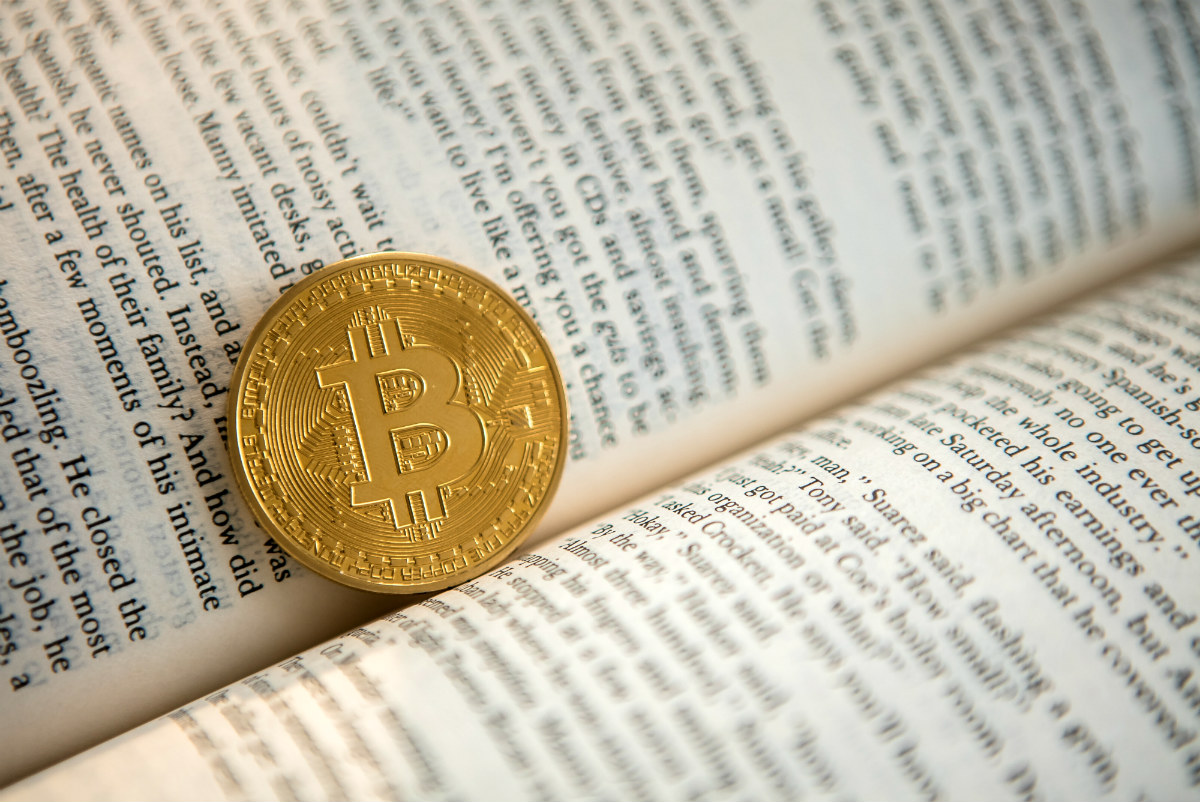 book representing cryptocurrency reporters